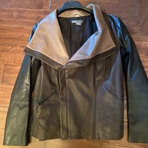 Vince leather jacket combined with sweater sleeve